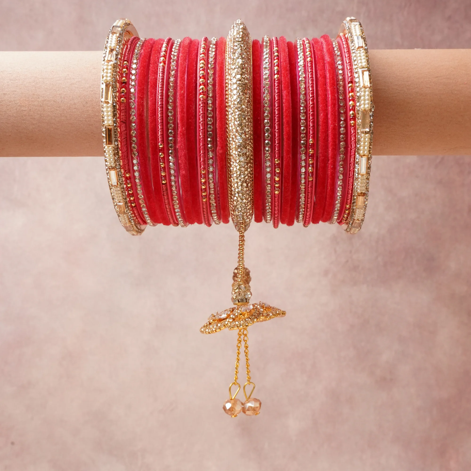 A commanding Coral Red anchors this beautiful set, enriched with accents of Warm Gold, Clear Crystal that add depth and dimension.

Featuring a striking composition of Velvet, Gold-Plated Metal, Faceted Crystals, Glass Beads, this set carries intricate craftsmanship and strong presence. Grand in form, it is created for moments that deserve to be marked.